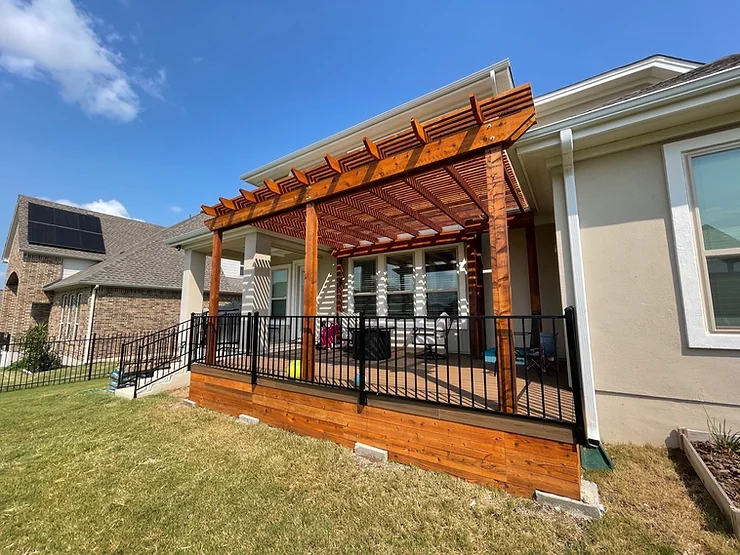 Austin, Texas home with custom deck and pergola installed by Sagamore.