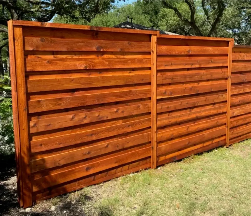 Leander 4 Horizontal cedar fence in the backyard of a Leander home.