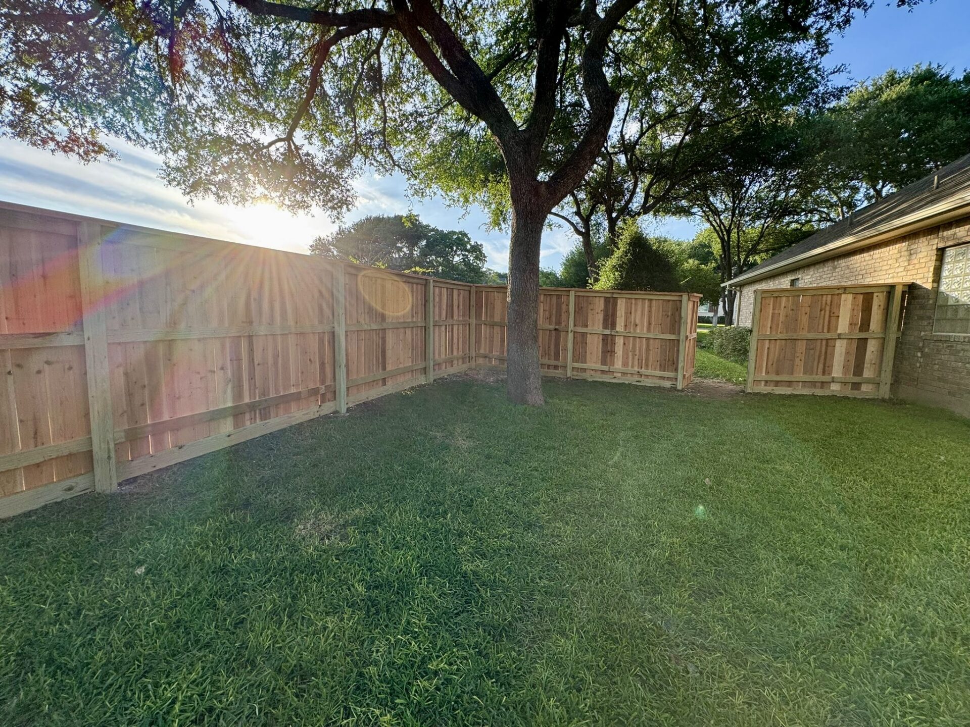 Who Is Responsible for Fence Repair Between Neighbors in Texas? 2 Wood Fence with Rot Board and Cap & Trim. Fence Repair Georgetown TX