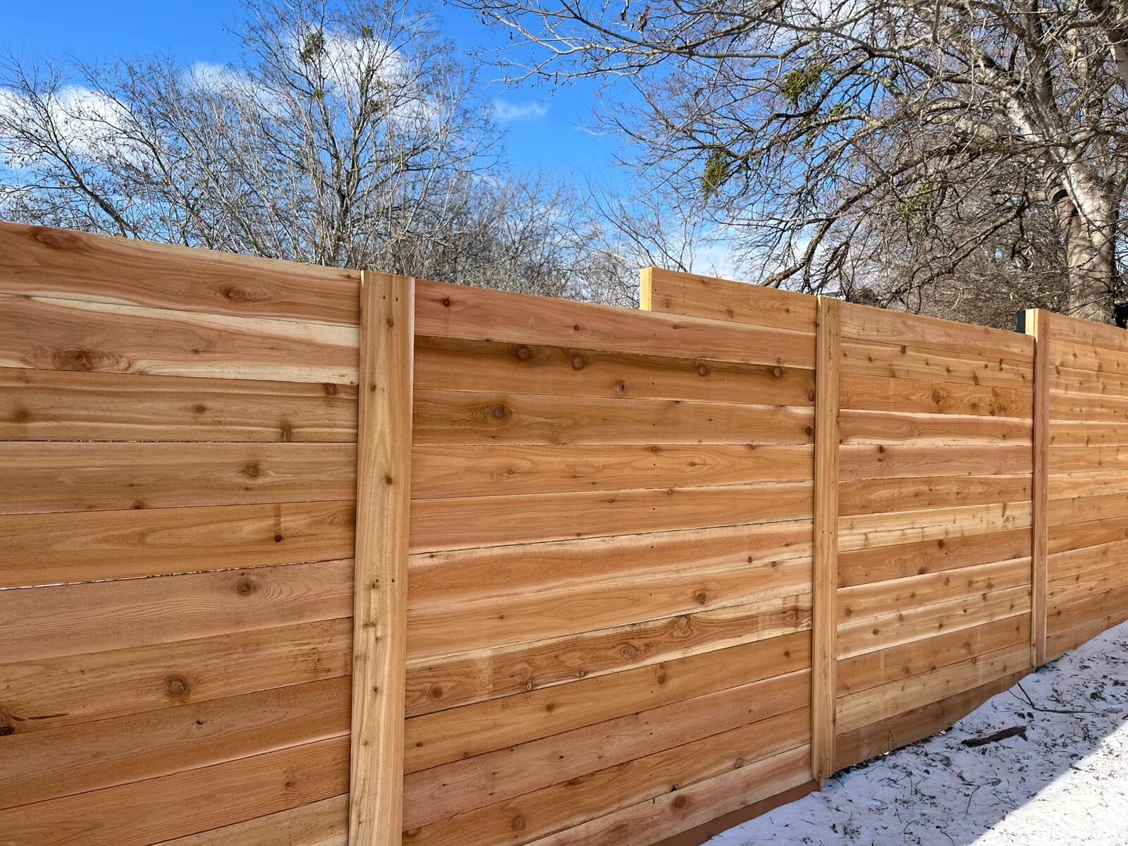 Horizontal wood fence in Georgetown Texas. Installed by Georgetown Fence Company Sagamore Fence & Deck